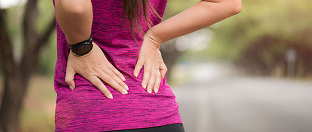 Woman suffering from low back pain San Francisco